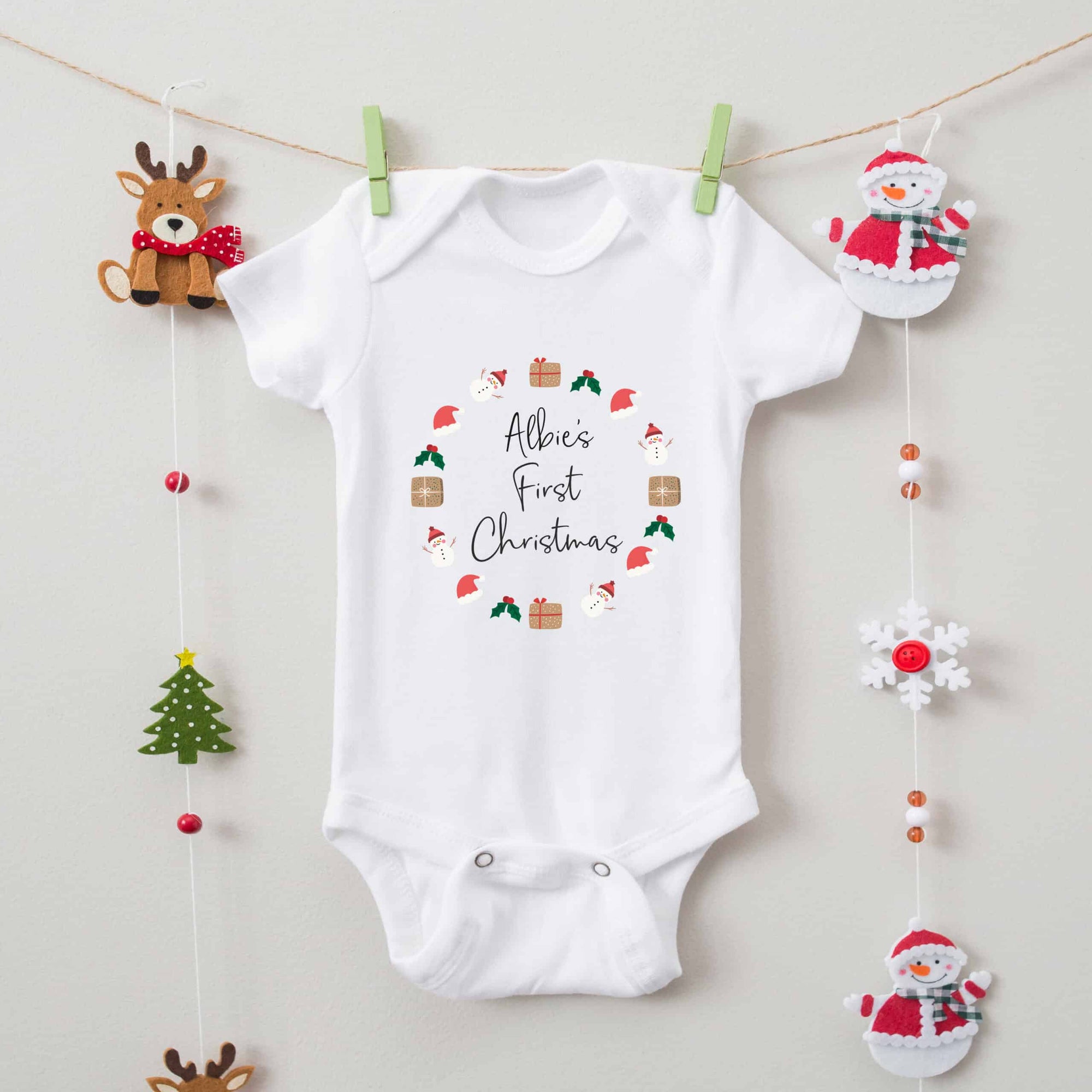 Personalised Baby's First Christmas Babygrow/Sleepsuit - Wreath